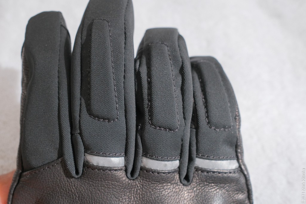 Middle through pinky finger knuckle protection.