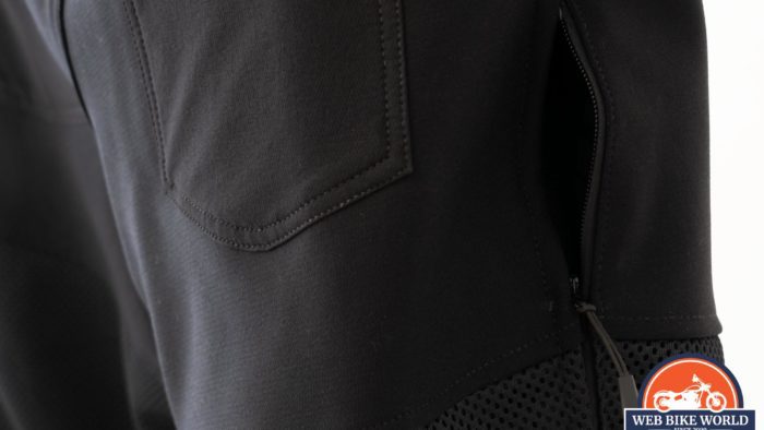 A close-up of the Knox Urbane Pro Trousers from the side, with the pocket zipper open.