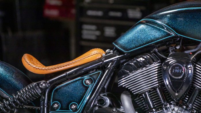 a view of the seat and tank cover of the custom motorcycle built by Indian Larry, Paul Cox, and Keino Sasaki