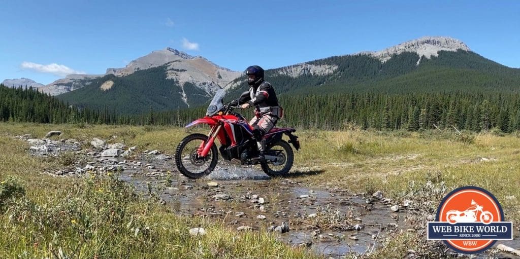 Me riding a 2021 Honda CRF300L Rally off-road in Kananaskis, Alberta.