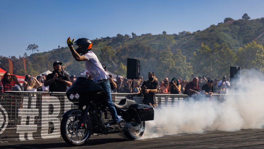 a view of a rider showing off his V-Twin on a series of stunts at the 2021 Bell Brawl series