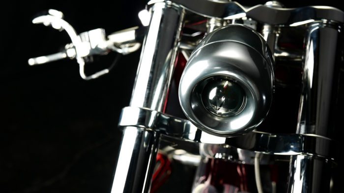 a view of the headlight on the Bad Land 1992 EVO 300 Wide Tire Chopper, also known as ‘The Hades Chopper’.