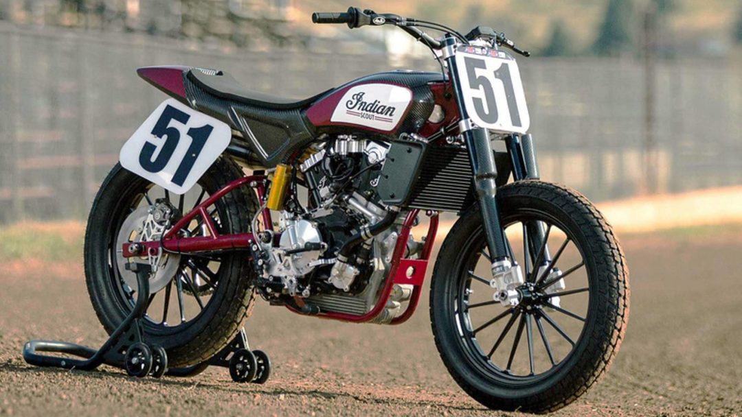 A view of an Indian Scout FTR750 on a wooden podium