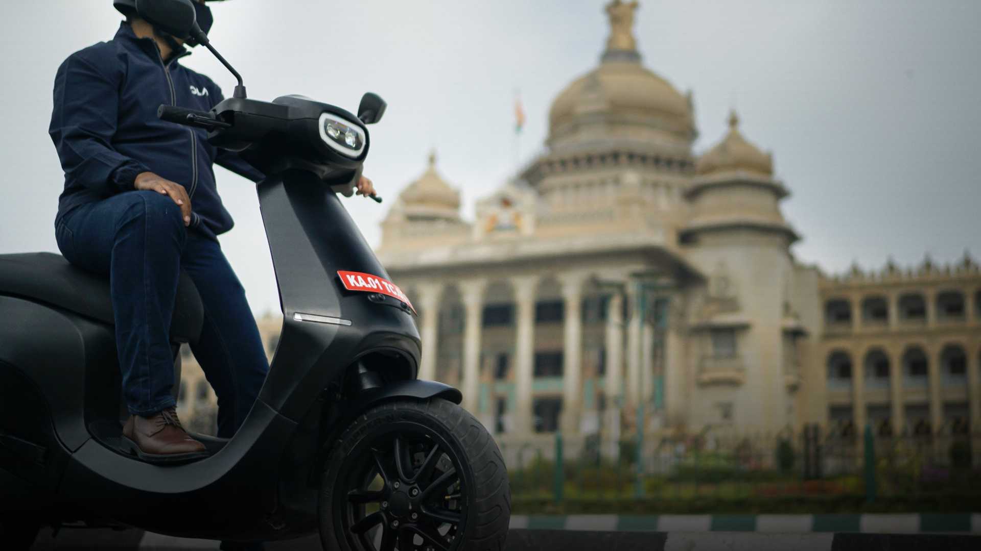 A side view of a rider enjoying the Ola Electric S1 Scooter