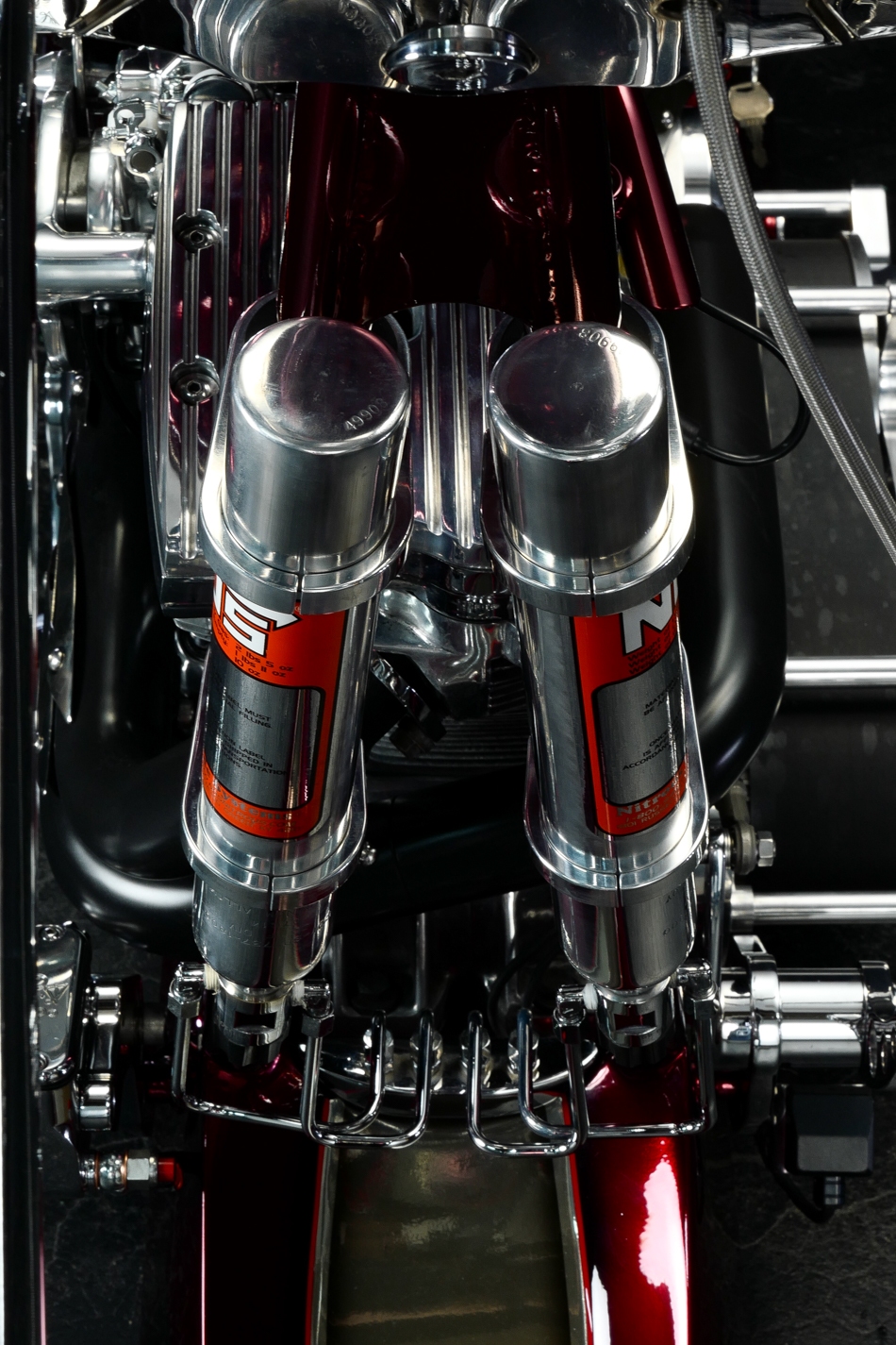 a close-up of the air suspension onthe Bad Land 1992 EVO 300 Wide Tire Chopper, also known as ‘The Hades Chopper’. a close-up of the air suspension onthe Bad Land 1992 EVO 300 Wide Tire Chopper, also known as ‘The Hades Chopper’.