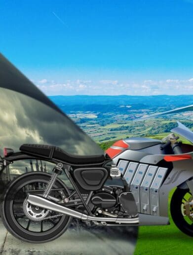 A side view of a motorcycle and rider riding into a cleaner future