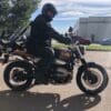 A side view of Simon Bertram on the 2021 BMW R NineT Scrambler