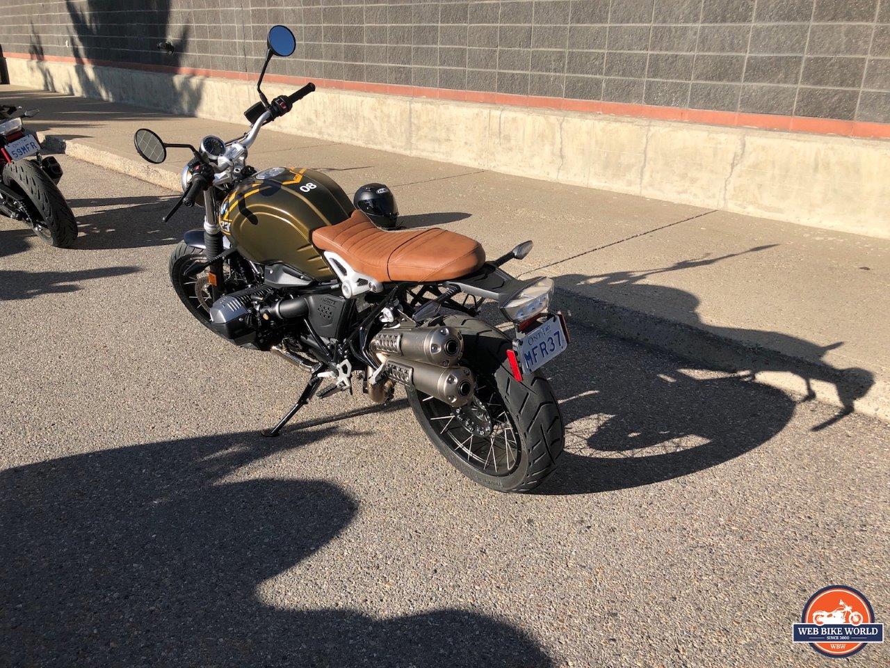 A rear 3/4 view of the 2021 BMW R NineT Scrambler prior to WBW's demo ride