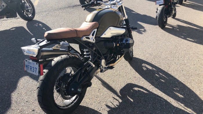 A rear 3/4 view from the right of the new 2021 BMW R NineT Scrambler prior to the demo ride