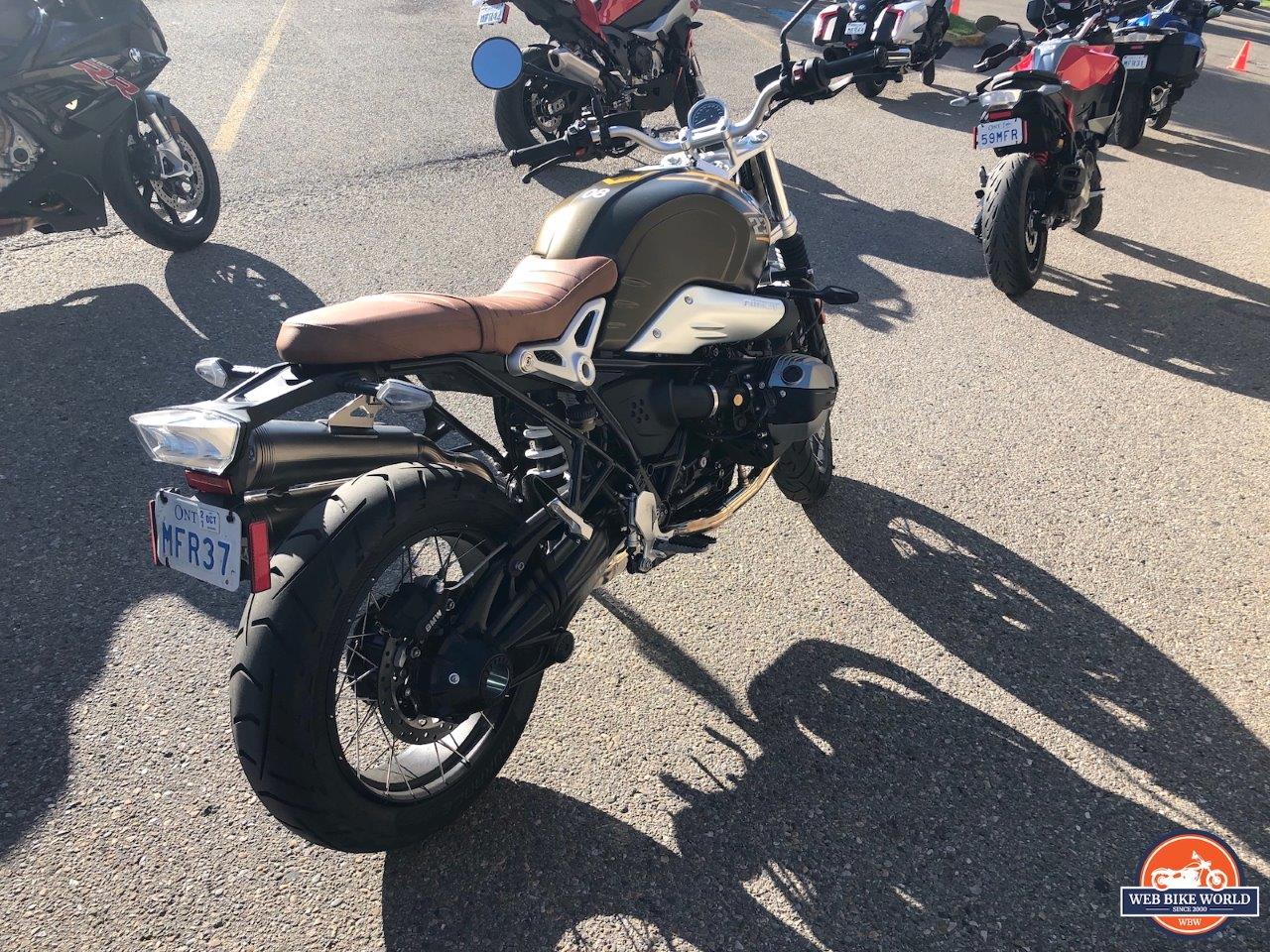A rear 3/4 view from the right of the new 2021 BMW R NineT Scrambler prior to the demo ride