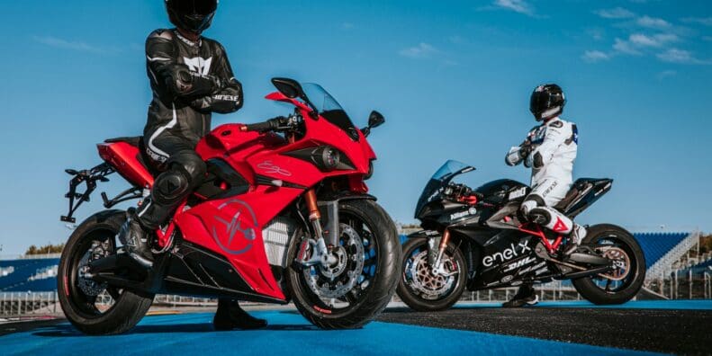 A side view of two riders astride their Energica Ego motorcycles