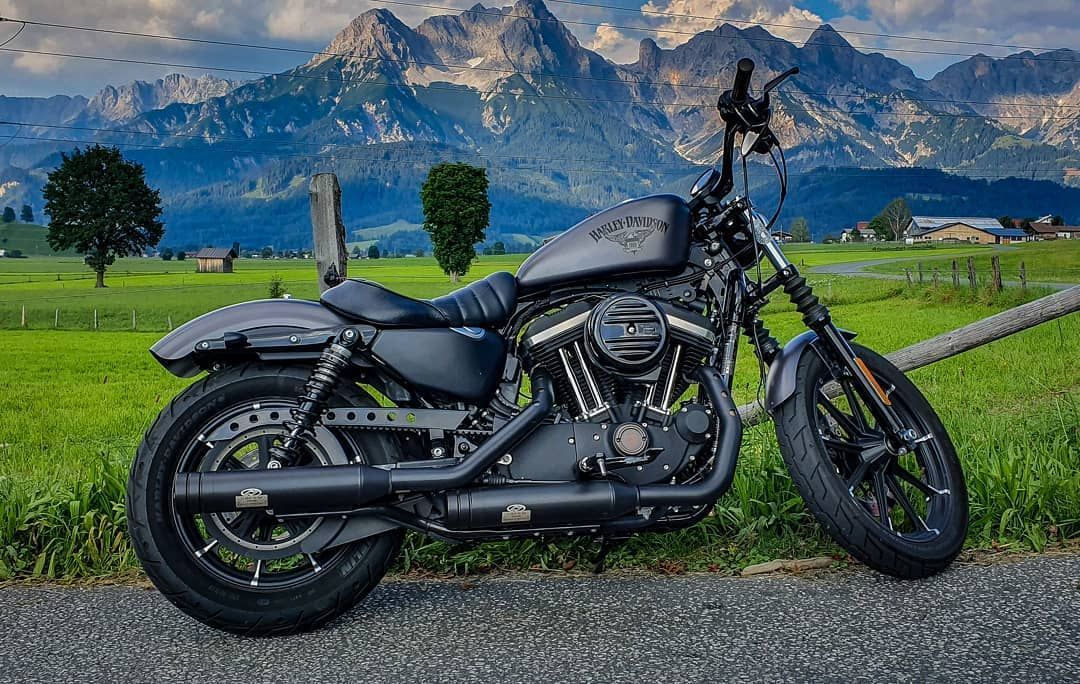 A view of a Harley Davidson in the Swiss mountains