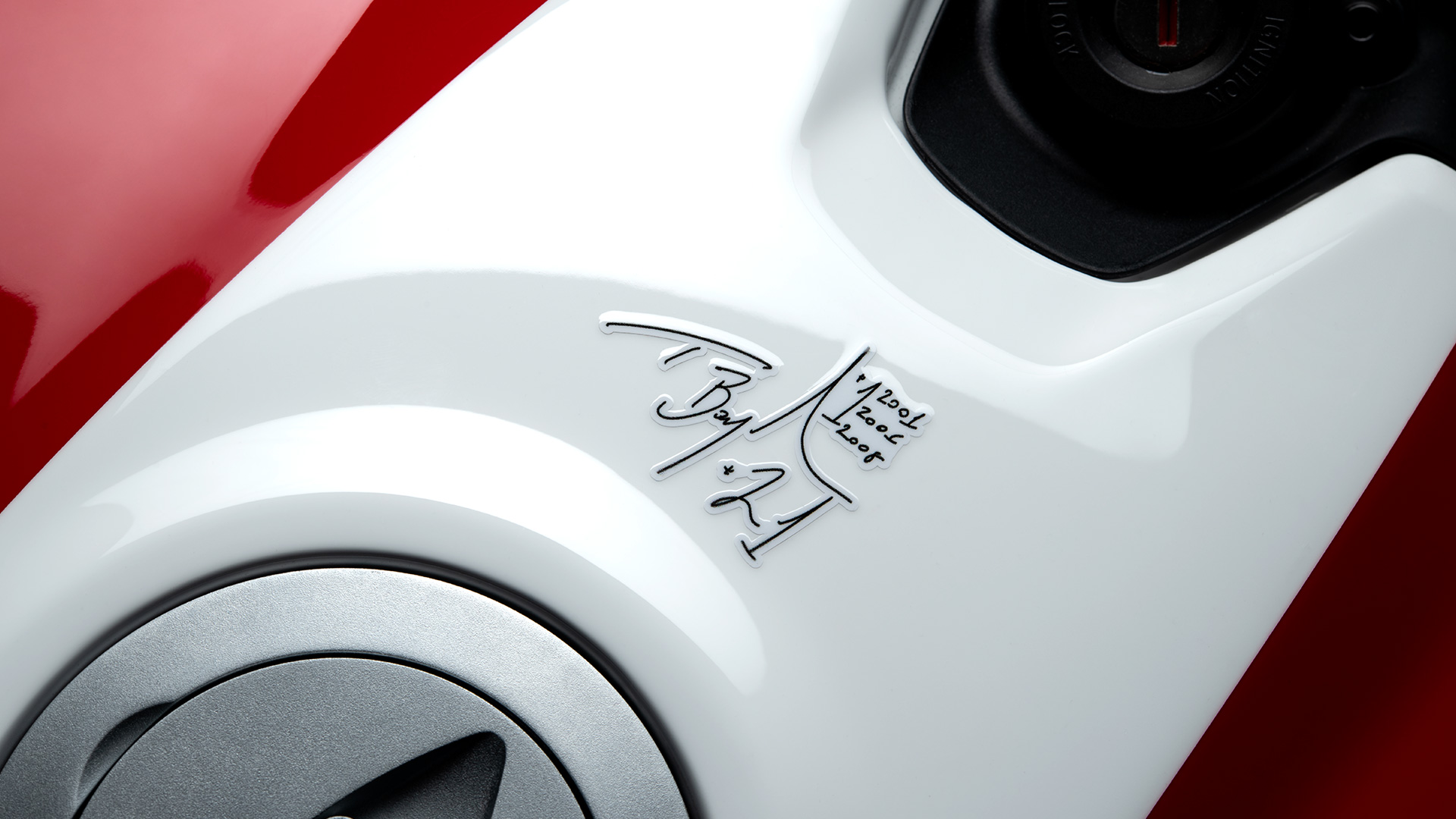 A view of the signature decal on the Troy Baylis 1st Championship 20th Anniversary Edition