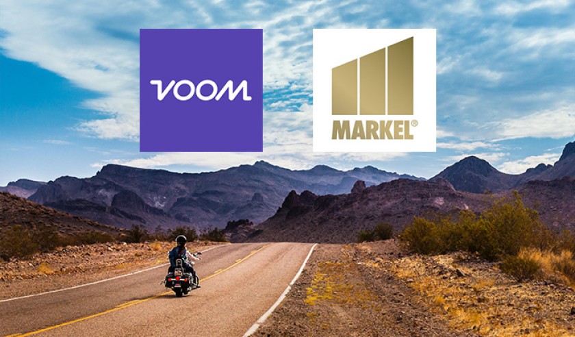 A view of a rider enjoying the benefits of the pay-per-mile insurance premium offered by insurance companies Voom and Markel