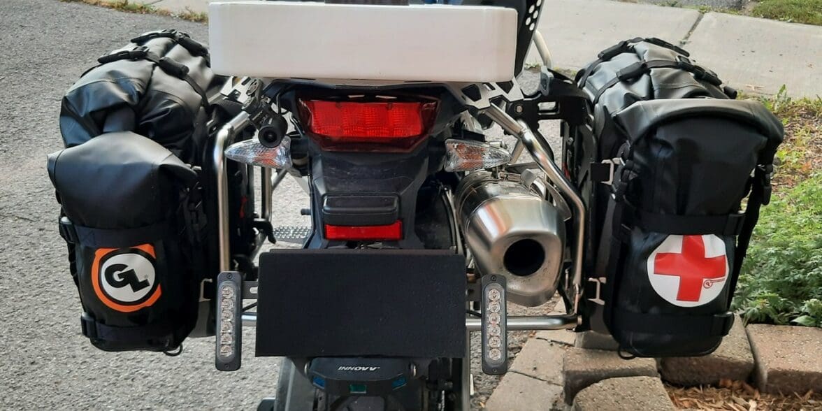 Rear view of GL Possible Pouches mounted onto adventure motorcycle