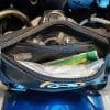 Open zipper with contents inside the zigzag bag