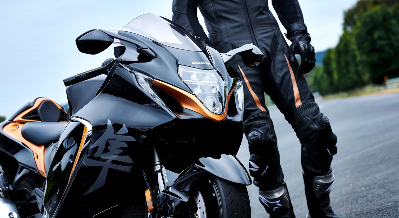 A view of a rider next to a 2022 Suzuki Hayabusa