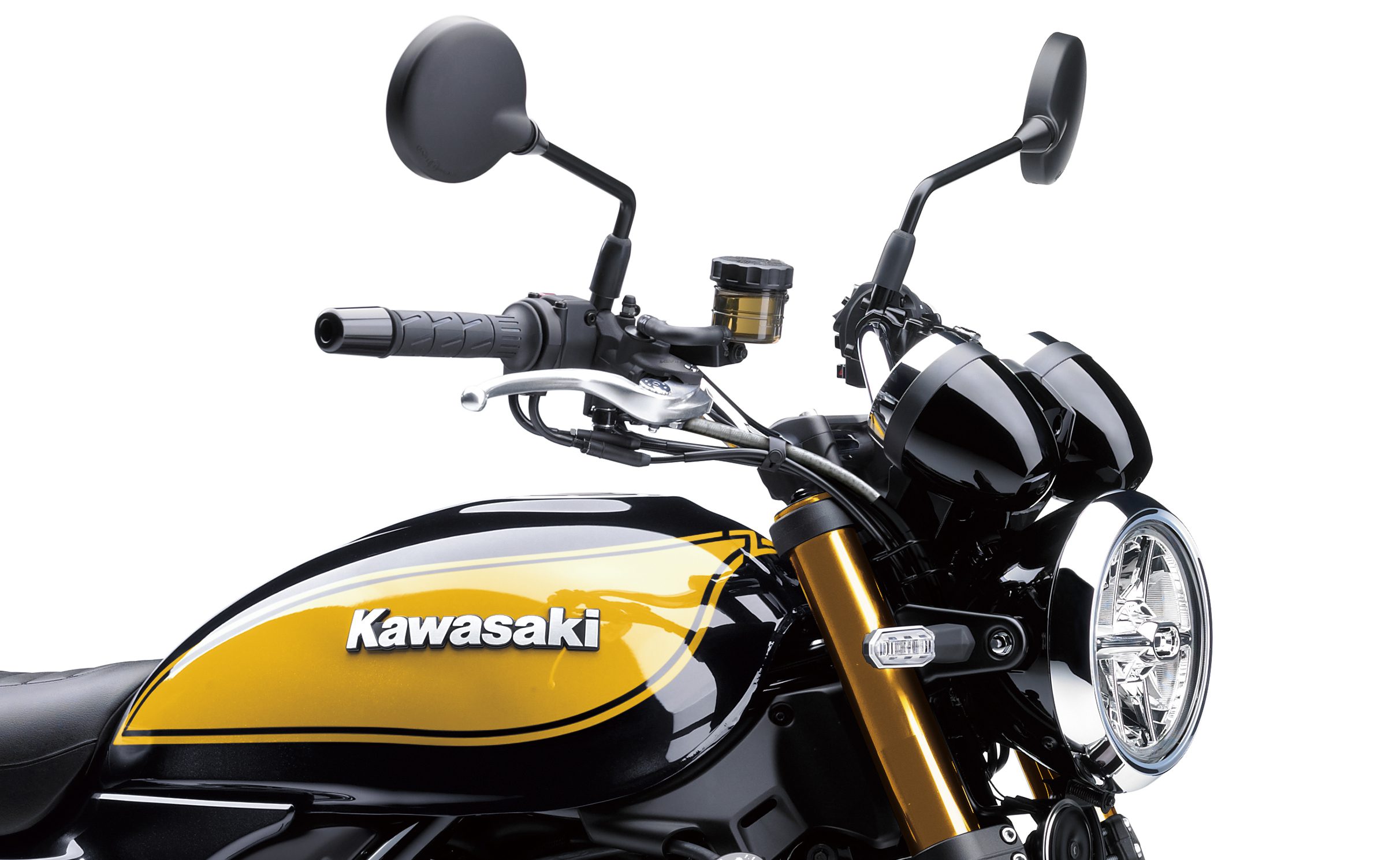 A close-up of the gas tank and handlebars on a 2022 Kawasaki Z650RS