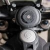 Closeup of the Quad Lock phone mount on the motorcycle handlebar