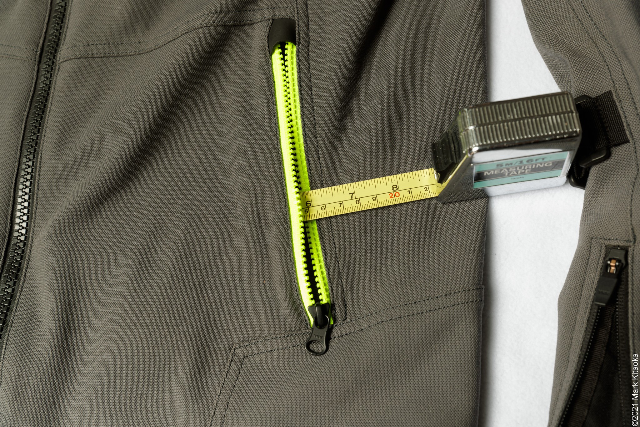 Measuring tape showing 6" of depth for the Klim jacket pocket