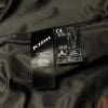 Closeup of tag inside Klim jacket