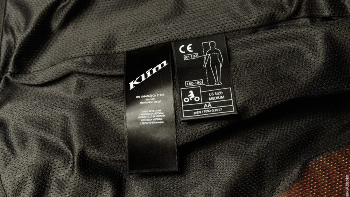 Closeup of tag inside Klim jacket
