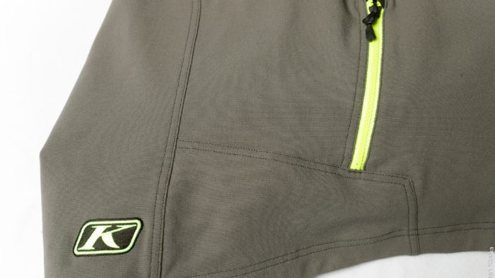 Reflective K logo on the rear right side of the jacket