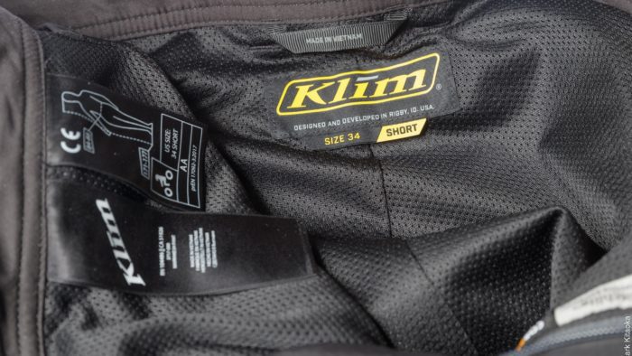 Interior tag of the Klim pants showing size and cut