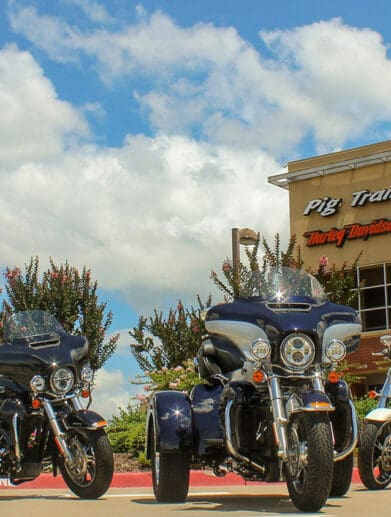 A view of Harley Davidson Motorcycle in front of Pigs Trails Harley Davidson Dealership