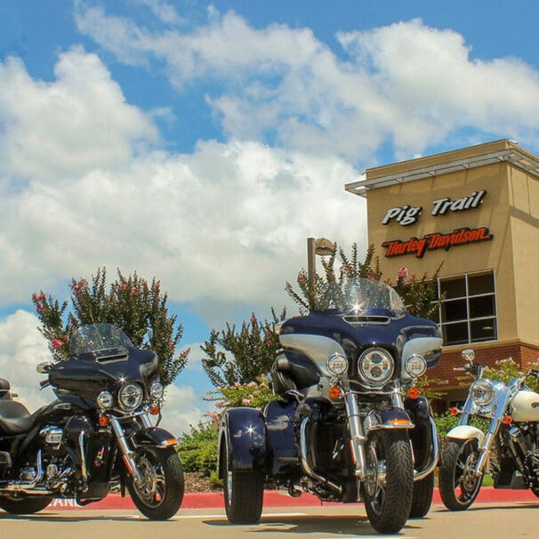 A view of Harley Davidson Motorcycle in front of Pigs Trails Harley Davidson Dealership