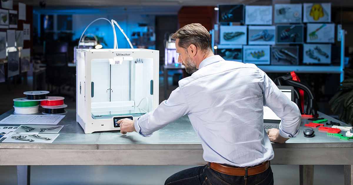A view of an employee trying out the Ultimaker 3D printing machines available through the company