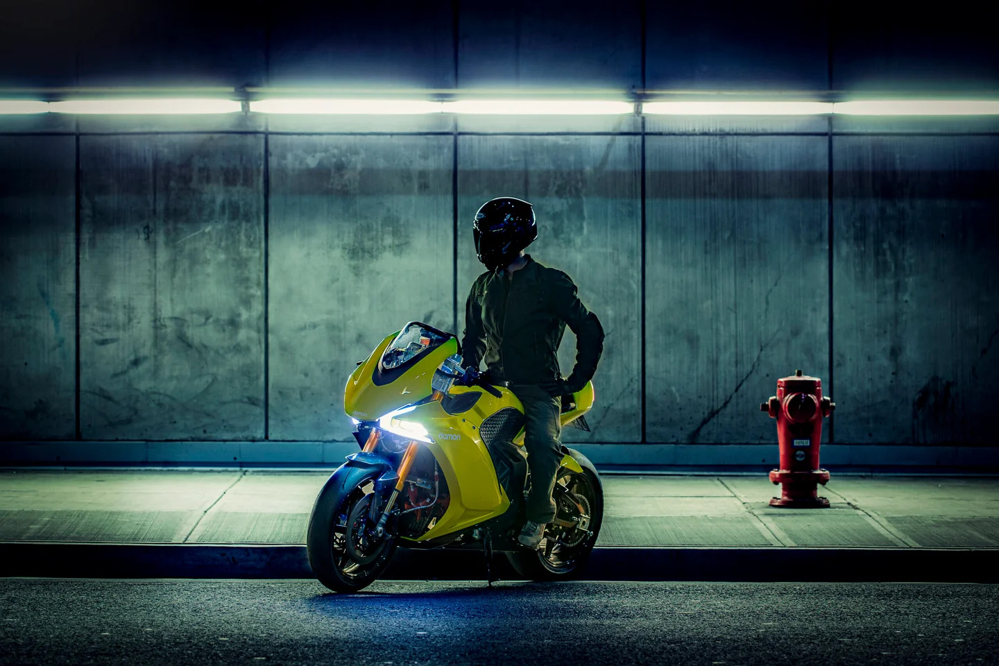 A view of a rider trying out the Damon Hypersport SE motorcycle