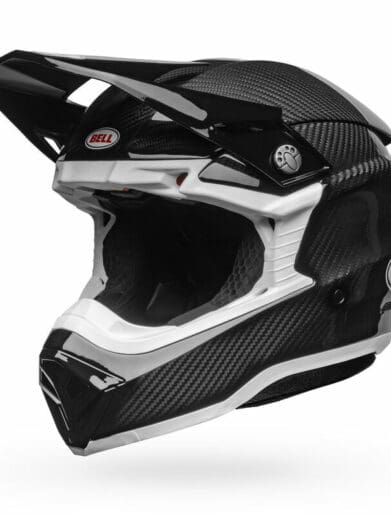 A front-right view of the Bell Moto-10 Full-Face helmet, in the new gloss carbon finish