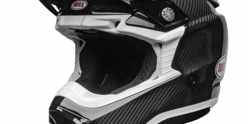 A front-right view of the Bell Moto-10 Full-Face helmet, in the new gloss carbon finish