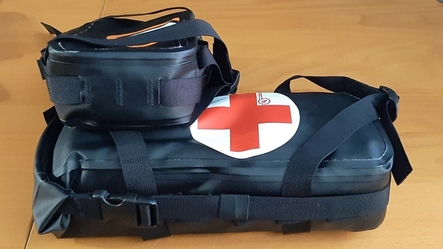 GL Possible Pouches with company logo and first aid logo