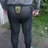 Rear view of rider wearing Kilm tactical base layer pants