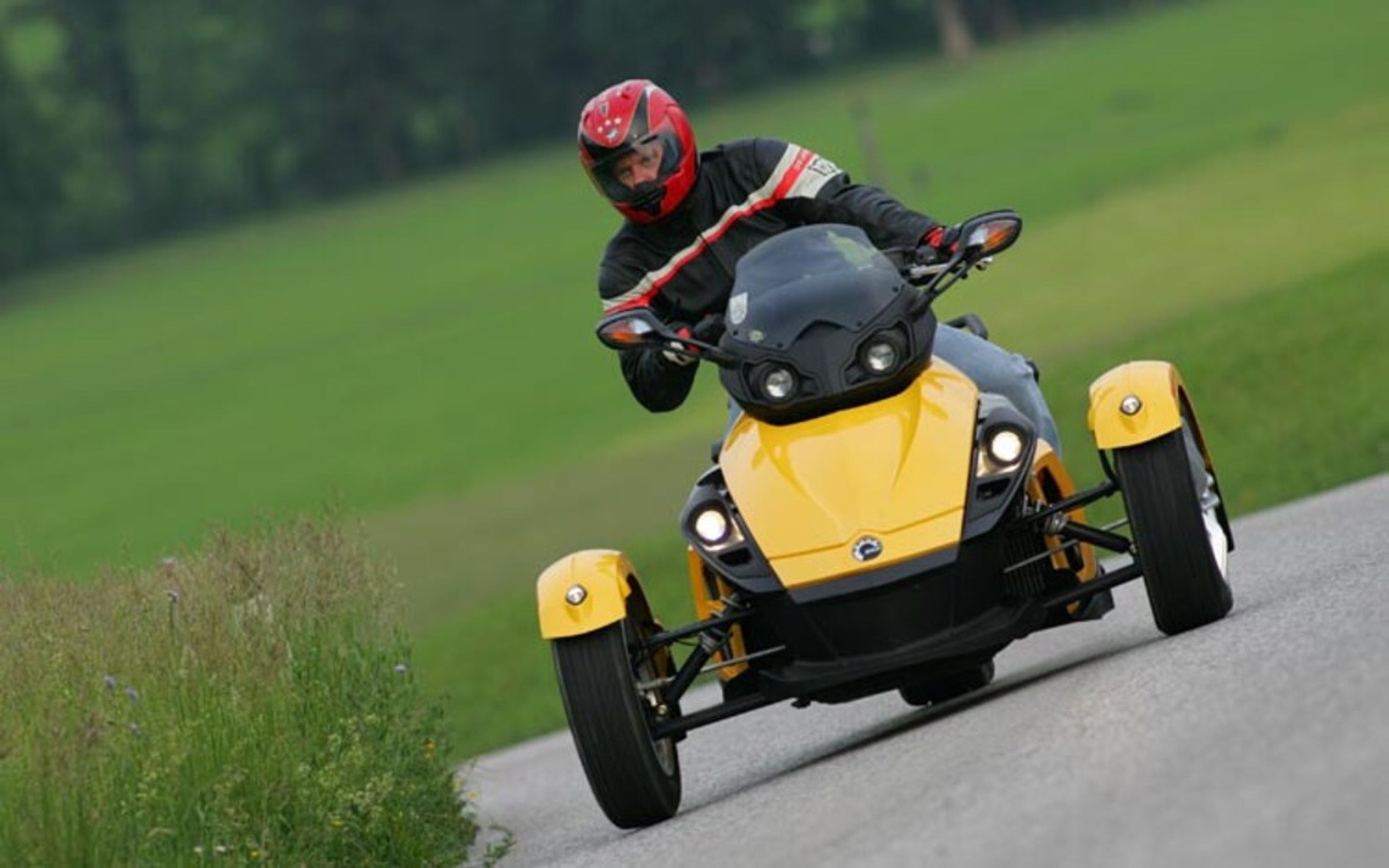  Yellow 2007 CanAm Spyder on road