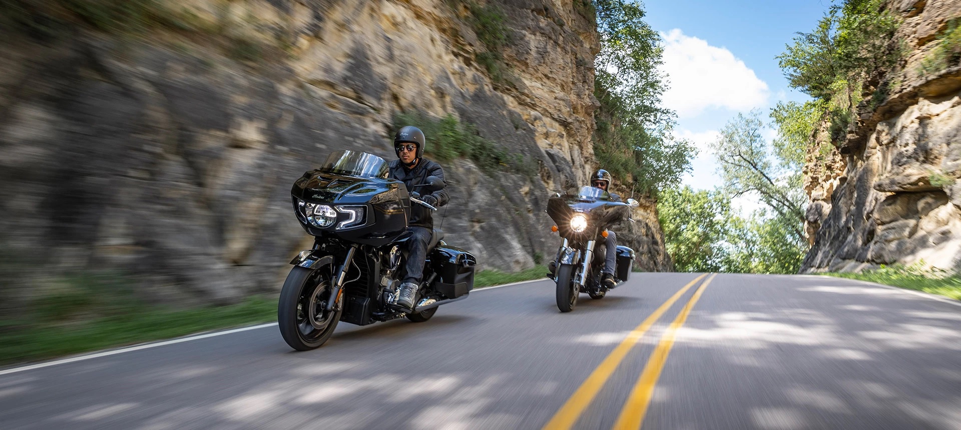 2021 Indian Challenger, with riders enjoying a lean into the twisties