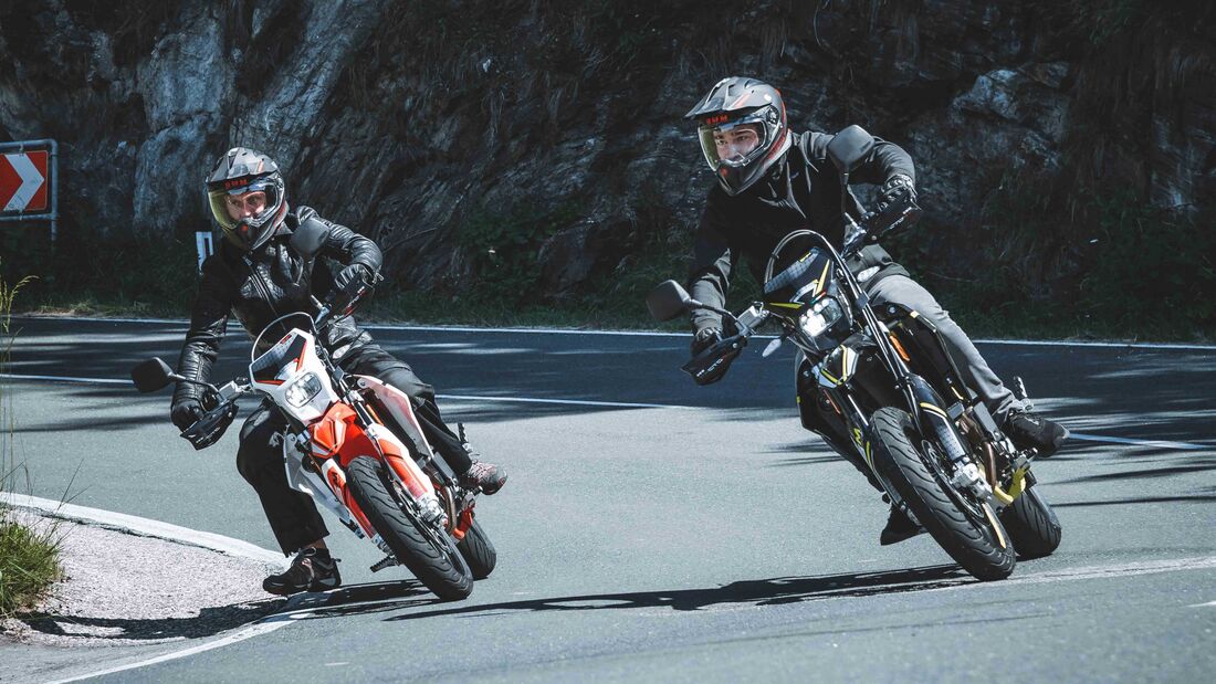 An image of two riders on the SWM 125s