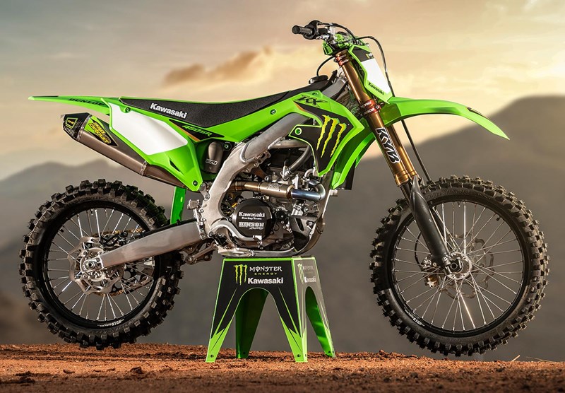 A side profile of the new 2022 Kawasaki KX450SR edition on a dirt track