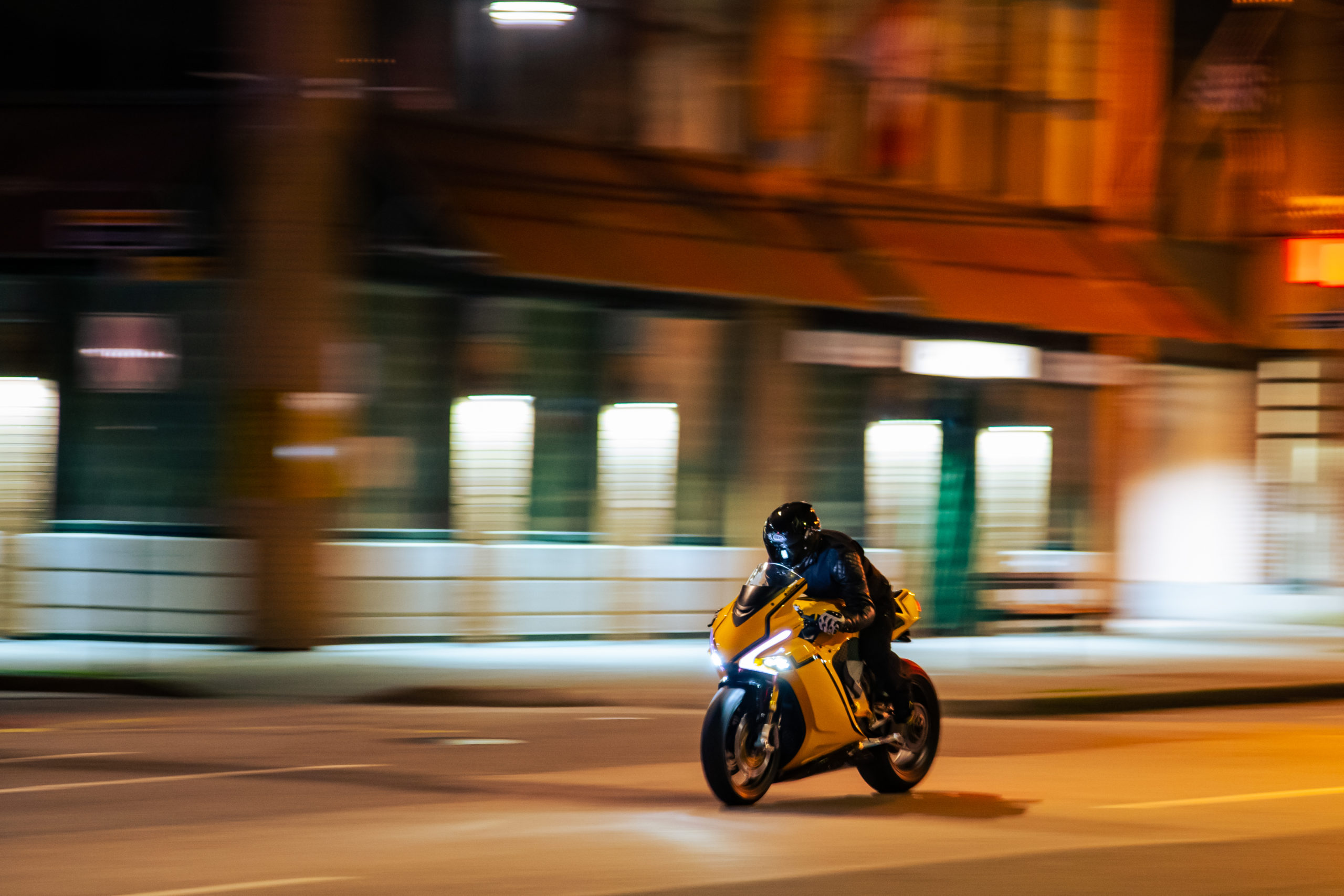 A night-scene of a rider trying out the Damon Hypersport