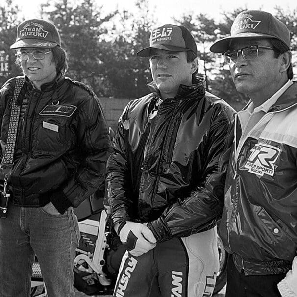Etsuo Yokouchi (right) with racer Graeme Crosby (center) and John Ulrich (left) at the introduction of the 1985 GSX-R750 at the Ryuyo test track in Japan. Photo by Masao Suzuki, curated from RoadRacingWorld