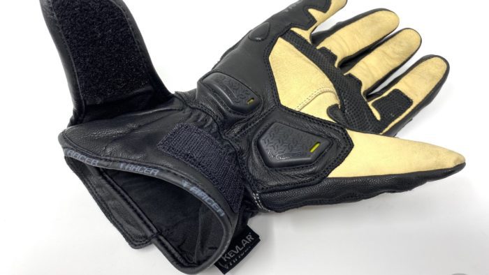 Closeup palm view of the gloves showing the wrist velcro straps Closeup palm view of the gloves showing the wrist velcro straps