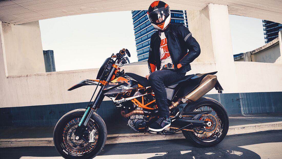 Image of a rider sitting on a KTM wearing Rekurv apparel
