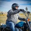 A view of the WBW reviewer trying out the Rev'it Echo Gloves holding the bars of his Harley Davidson Sportster, and wearing a Simpson Speed Bandit helmet.