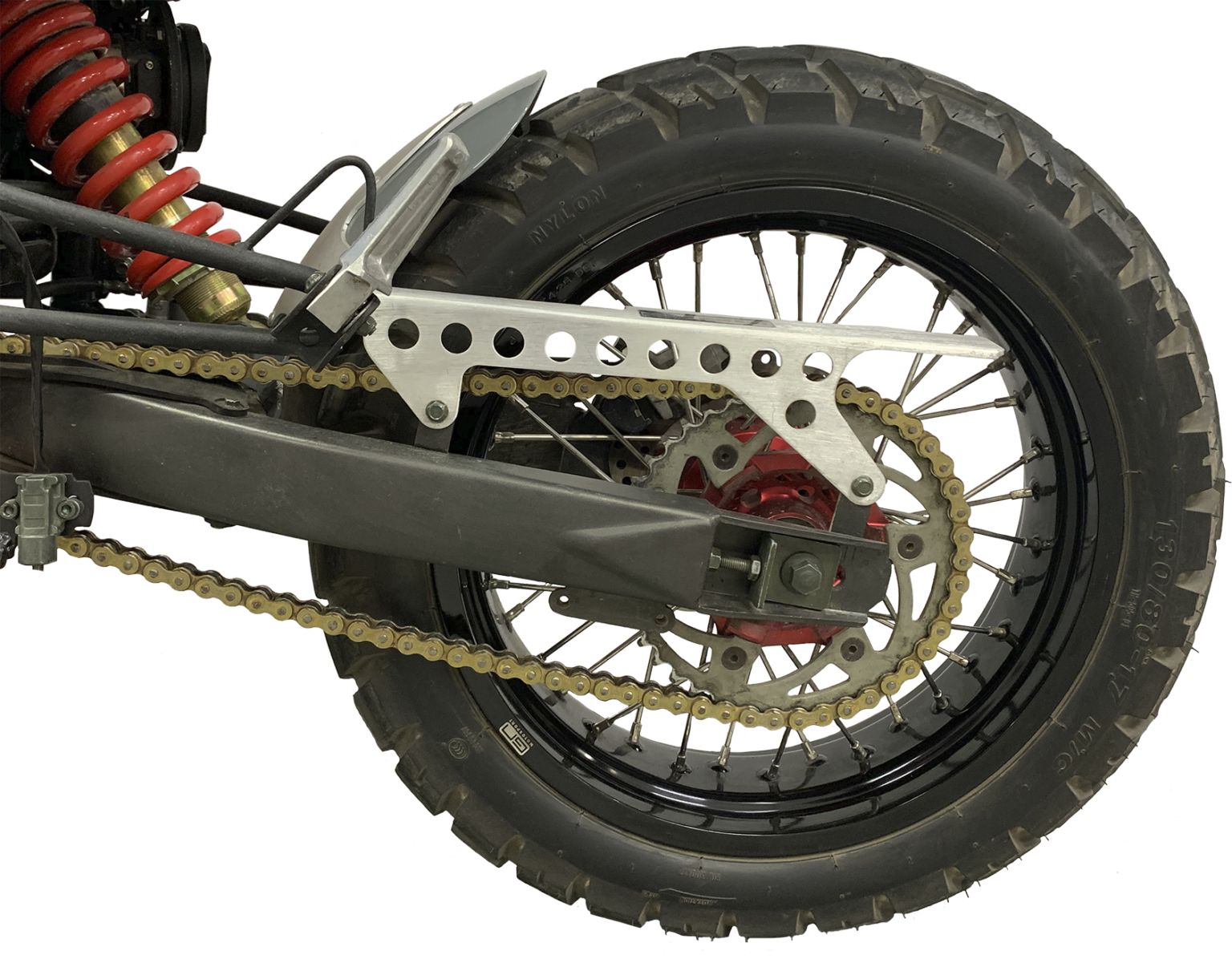 A view of the back wheel on the ScrAmper - an electric motorcycle from Ukranian brand EMGo, capable of using an electric car charger