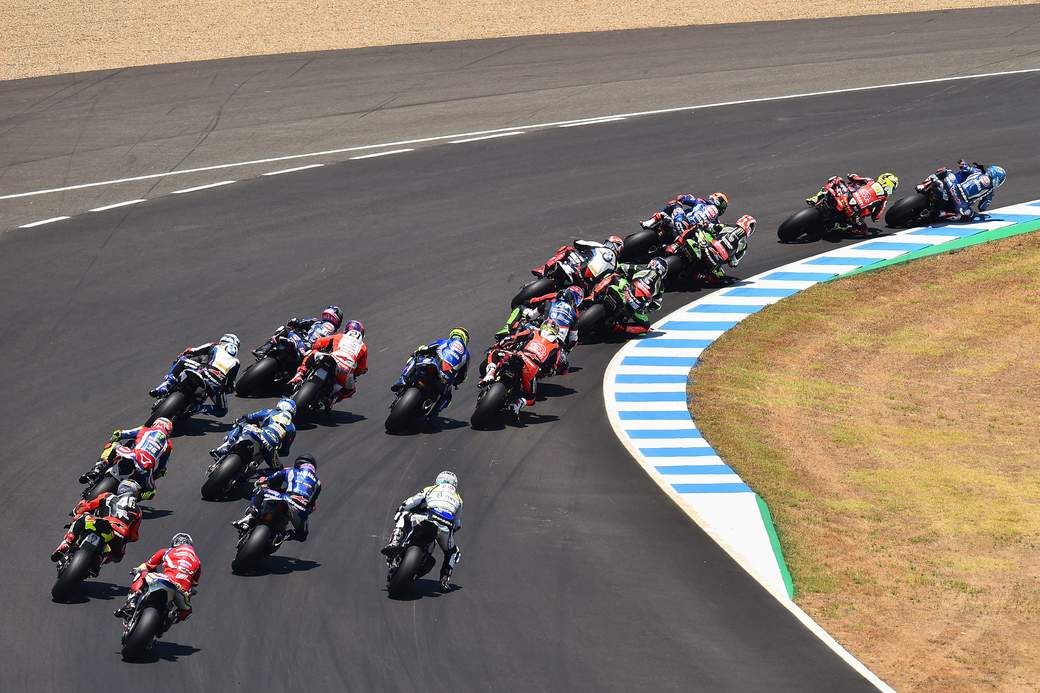 WorldSSP300: A lineup of riders leaning into the twisties