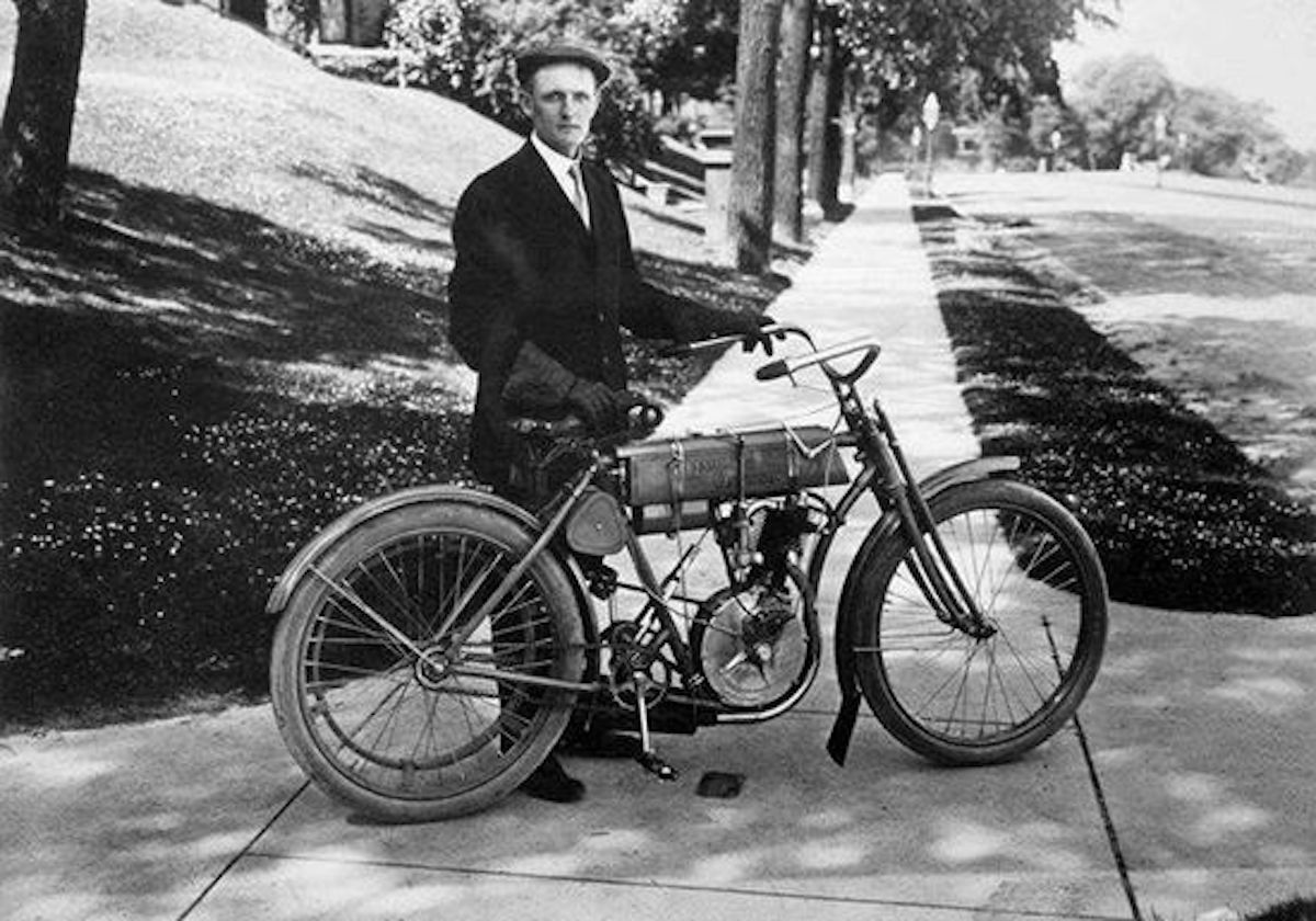 A few of a Harley-Davidson founder with one of the first Harley-Davidson machines, built in 1903. 