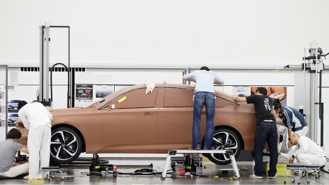 A side view of a Honda car being modelled from clay as a prototype for the Japanese Manufacturer