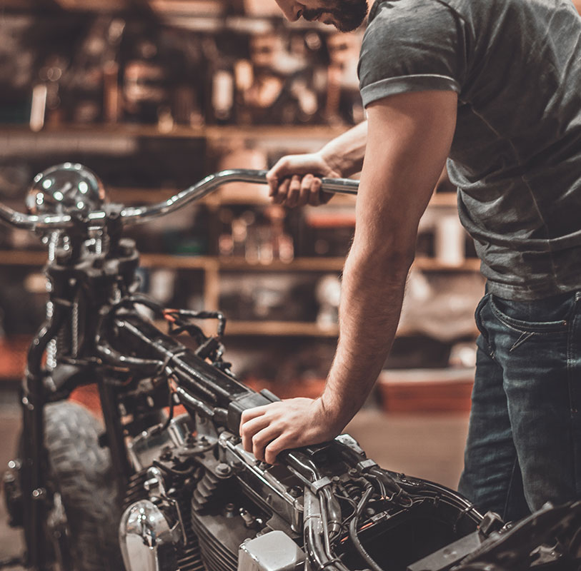 A view of a rider linking on his motorcycle in connection with current UK proposals to make motorcycle modifications illegal